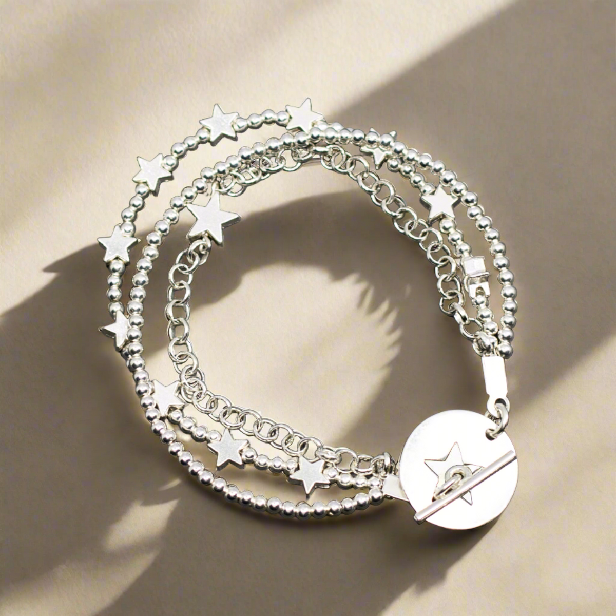 Silver Plate Multi Strand Star Charm Bracelet With T-Bar Clasp
