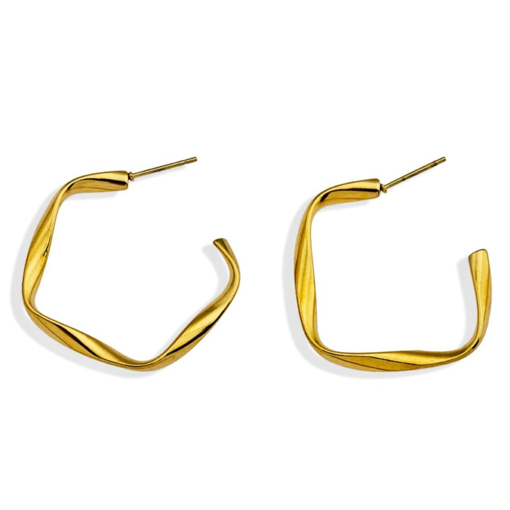 Boucles d'oreilles créoles sculpturales ADAMMA