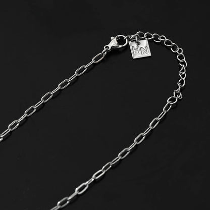Style ALARA : Mini chaîne trombone ancrant un charm cœur à motifs en argent