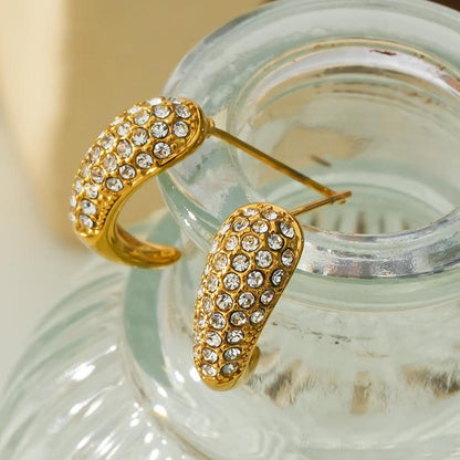 ANCORA : Puces d'oreilles en forme de poire avec pavé de zircones cubiques (CZ).