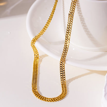 ANIMA : Collier simple à double chaîne, largeur XL et détails travaillés