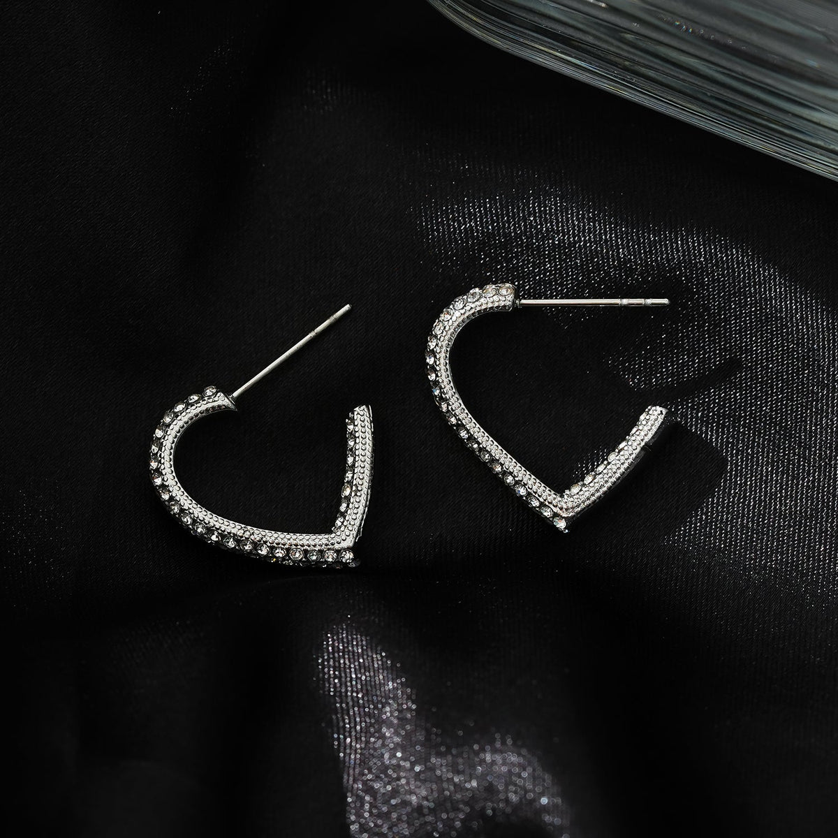 Style ANJAR White Gold (Silver Tone): Heart Shaped Hoops embedded with Zirconia Gemstones