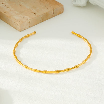 BENONI Gold: Collier ras du cou texturé bambou.