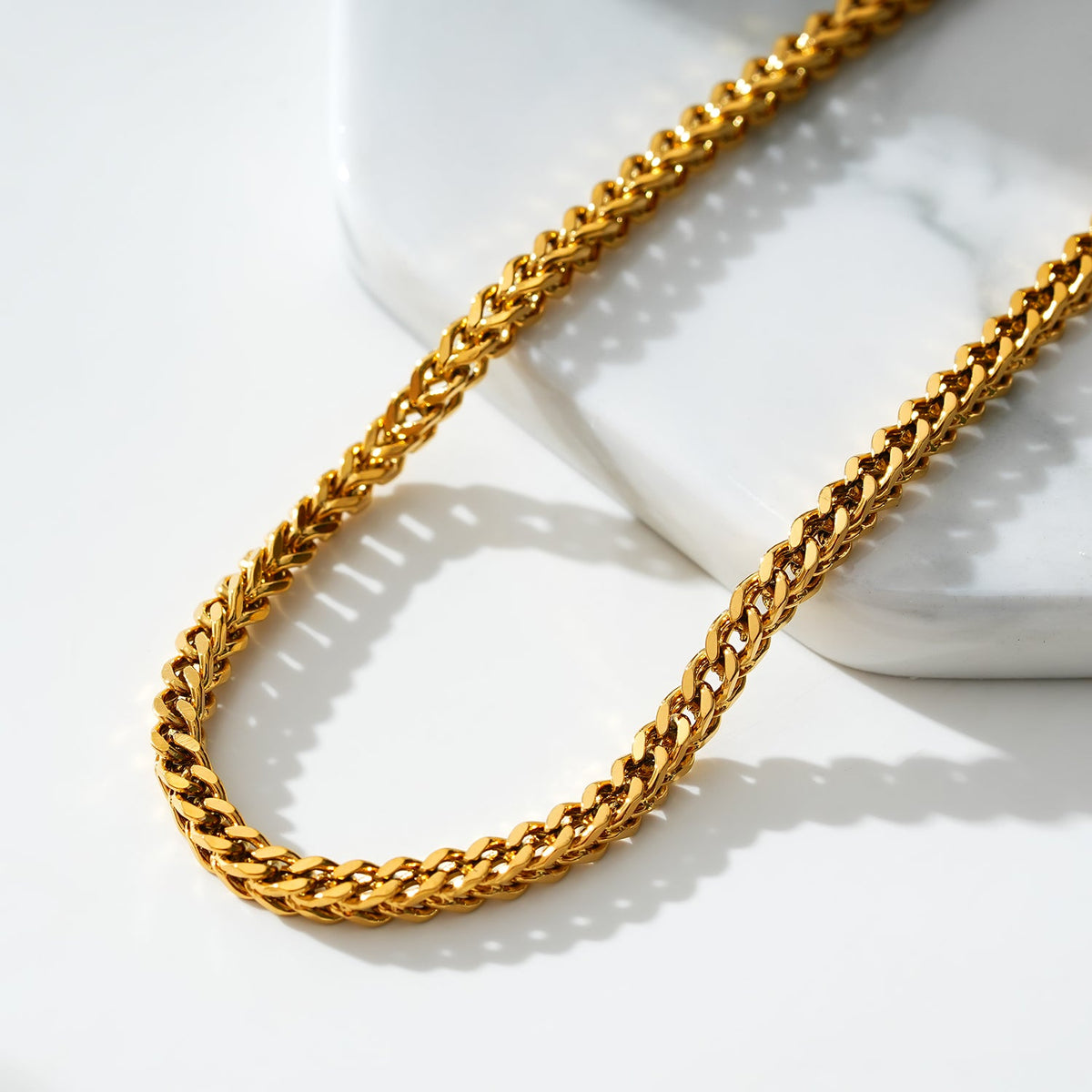 BRIELLA LG: Chaîne maille cubaine en or pour cheville