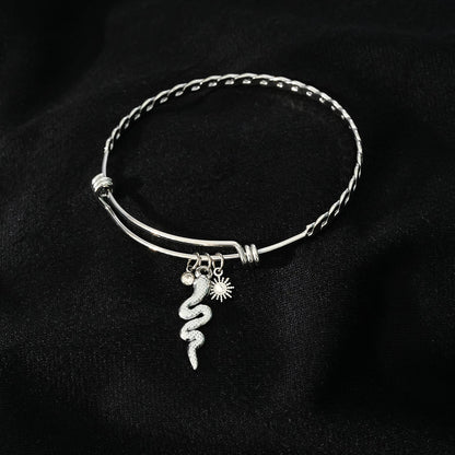 CATALINA Or Blanc (ton argenté) : Bracelet avec Breloques Serpent, Symbole Solaire et Zirconia (CZ).