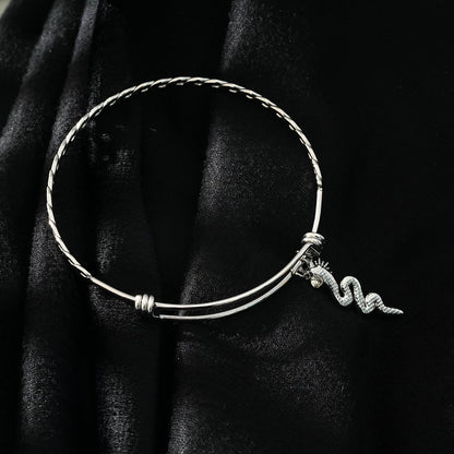 CATALINA Or Blanc (ton argenté) : Bracelet avec Breloques Serpent, Symbole Solaire et Zirconia (CZ).