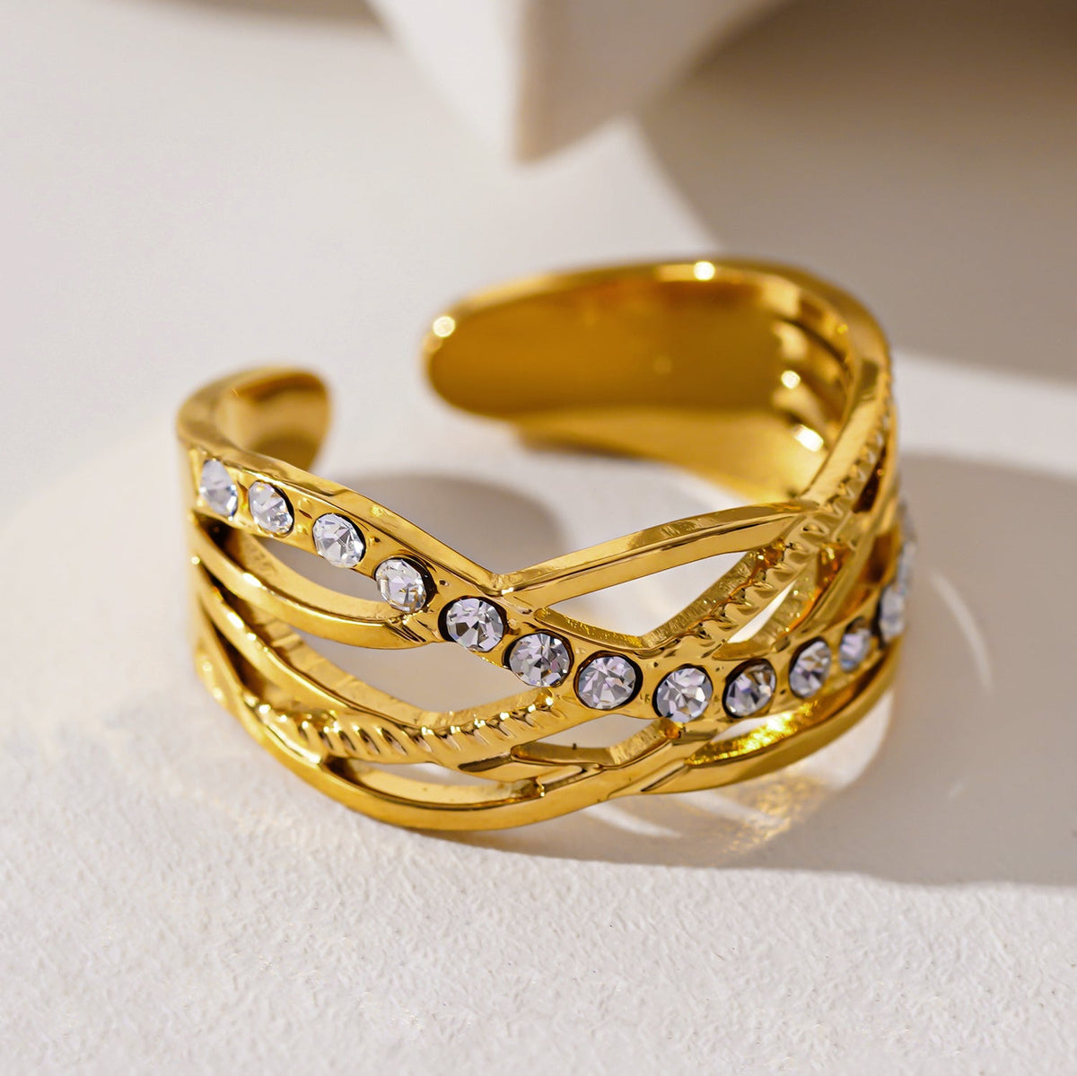 Style CORAZON: Cross Over Multi Stacked Zirconia Embedded Ring