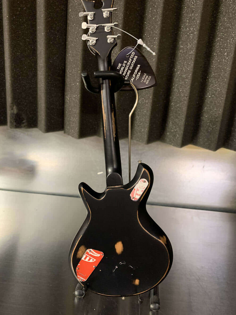 Stephen McSwain Cort Motor Oil - Série Fuel. Réplique de mini-guitare.