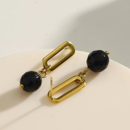 Boucles d'oreilles créoles pendantes en onyx noir DAKATA