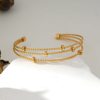 Bracelet perles texturées triple rang Style FARZIKA Gold