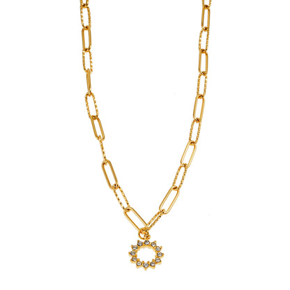 FRETTA: Radiant Star Shaped Pendant Zirconia Paper-Clip Chain Necklace in Gold.