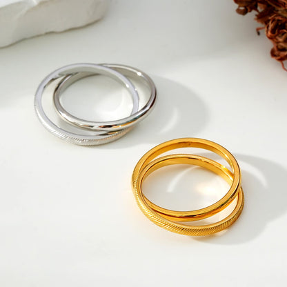 GILBERT: Double Banded Interconnected Stack Ring in White Gold (Silver Toned)