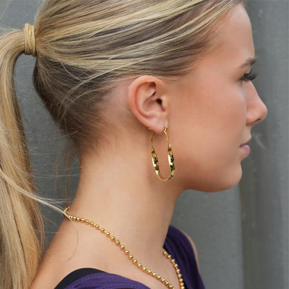 Boucles d'oreilles créoles semi-imposantes oblongues abstraites torsadées GISELA