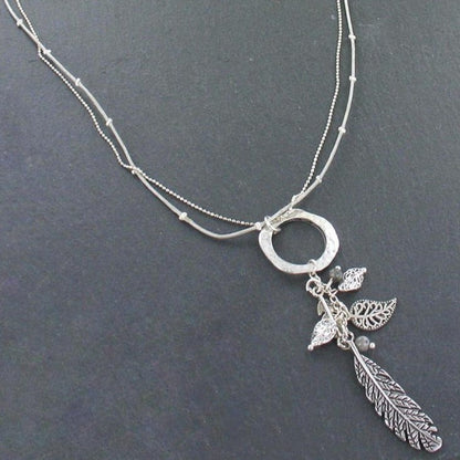 Beaten Ring Necklace With Leaf Charms In Silver Plate