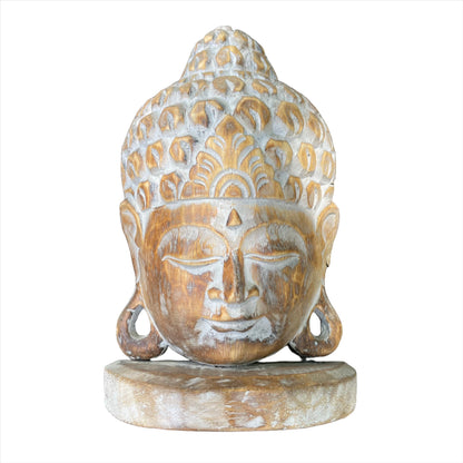 Tête de Bouddha sculptée à la main