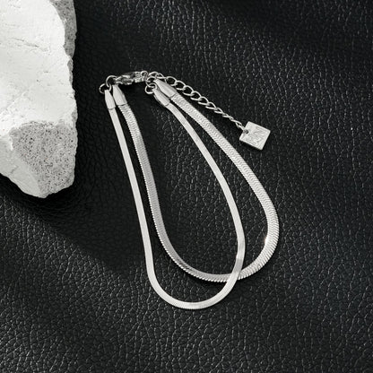 INESE : Bracelet en or blanc (ton argenté) à 2 couches, texture peau de serpent