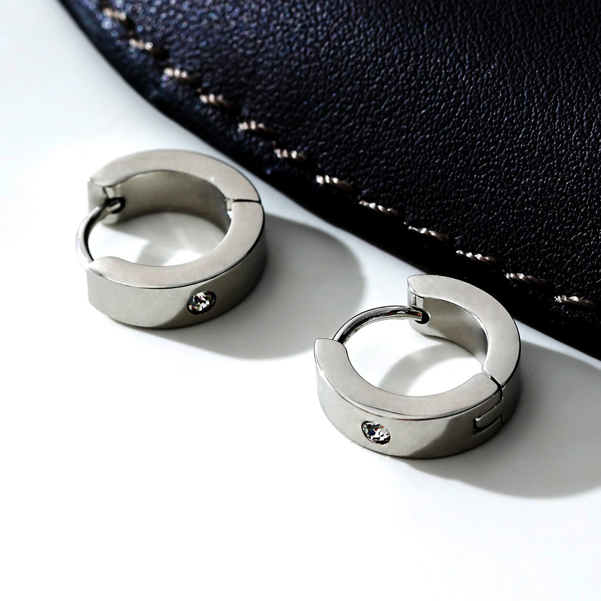 INIS: Wide Mini Hoop Earrings with a Solitaire Zirconia Gemstone in Silver