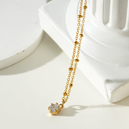 KADIRI Or : Pendentif Solitaire Zirconia sur un collier chaîne de perles