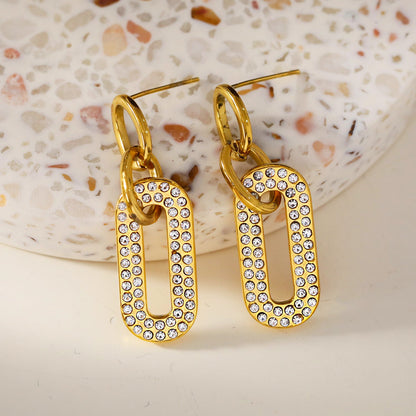 LAIA : Boucles d'oreilles de forme rectangulaire arrondie serties de pierres de zircone