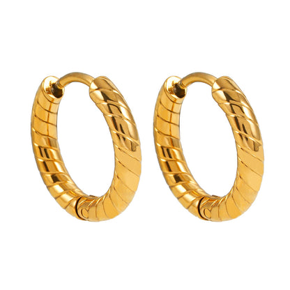 LUPITA : Boucles d'oreilles créoles texturées à motif tourbillon dorées