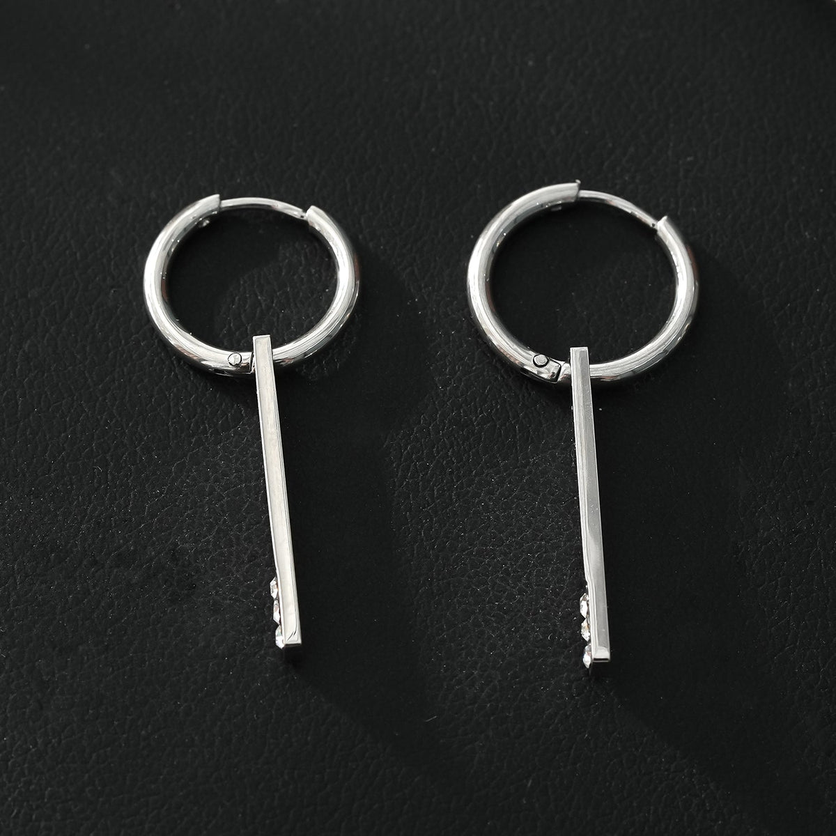 Style MAYLA: Silver Hoops with a Minimalist Charm featuring a Trio of Zirconia Gemstones