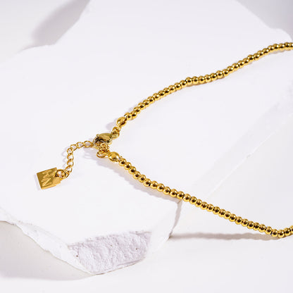 Style MILLIE : Collier chaîne en or à double perles fusionnées