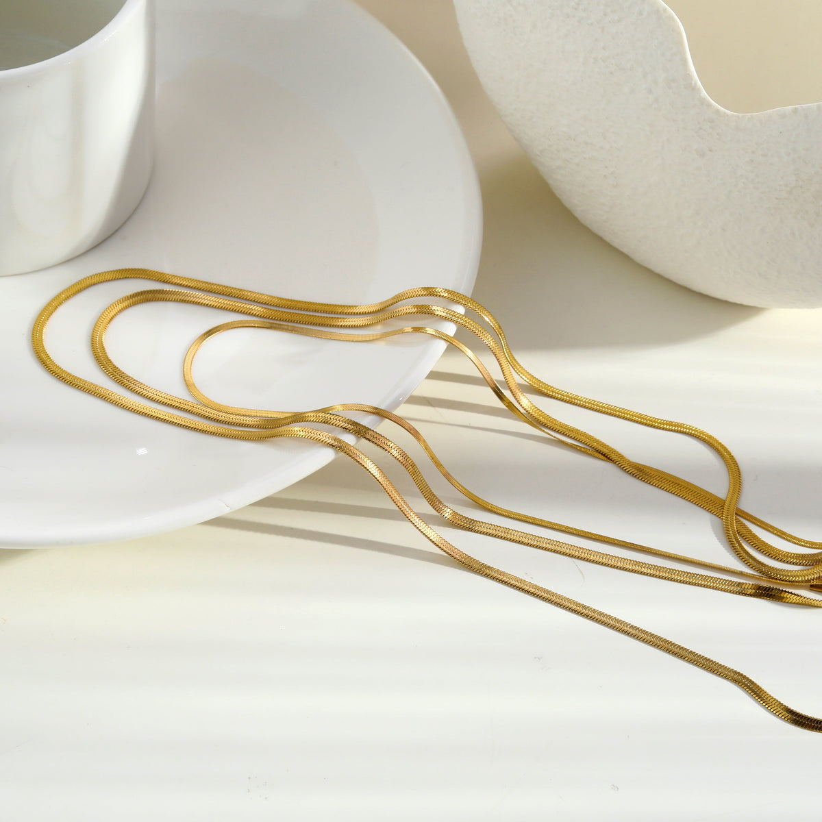 NALA : Collier doré triple couche effet peau de serpent
