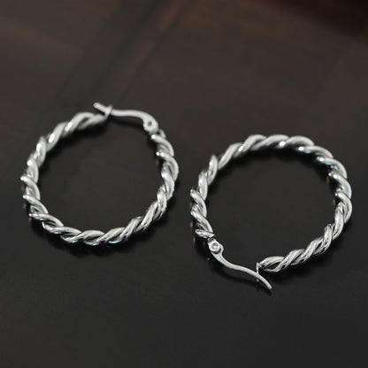 Boucles d'oreilles créoles torsadées SUKI en argent
