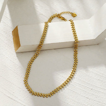 FANIA : Collier Chaîne Audacieuse à Motifs Végétaux