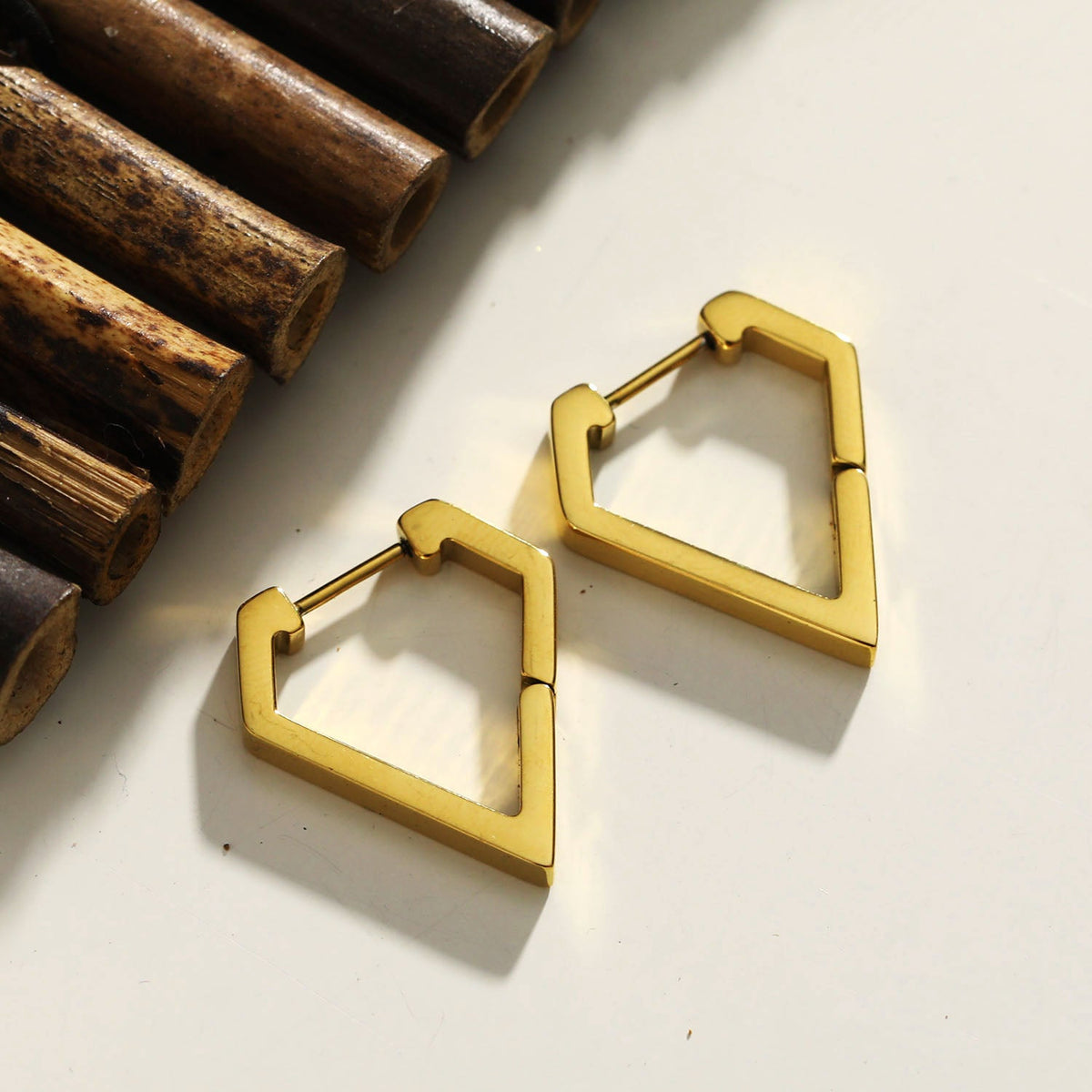 CAGLIARI: Triangle Shaped Contemporary Hoop Earrings in Gold
