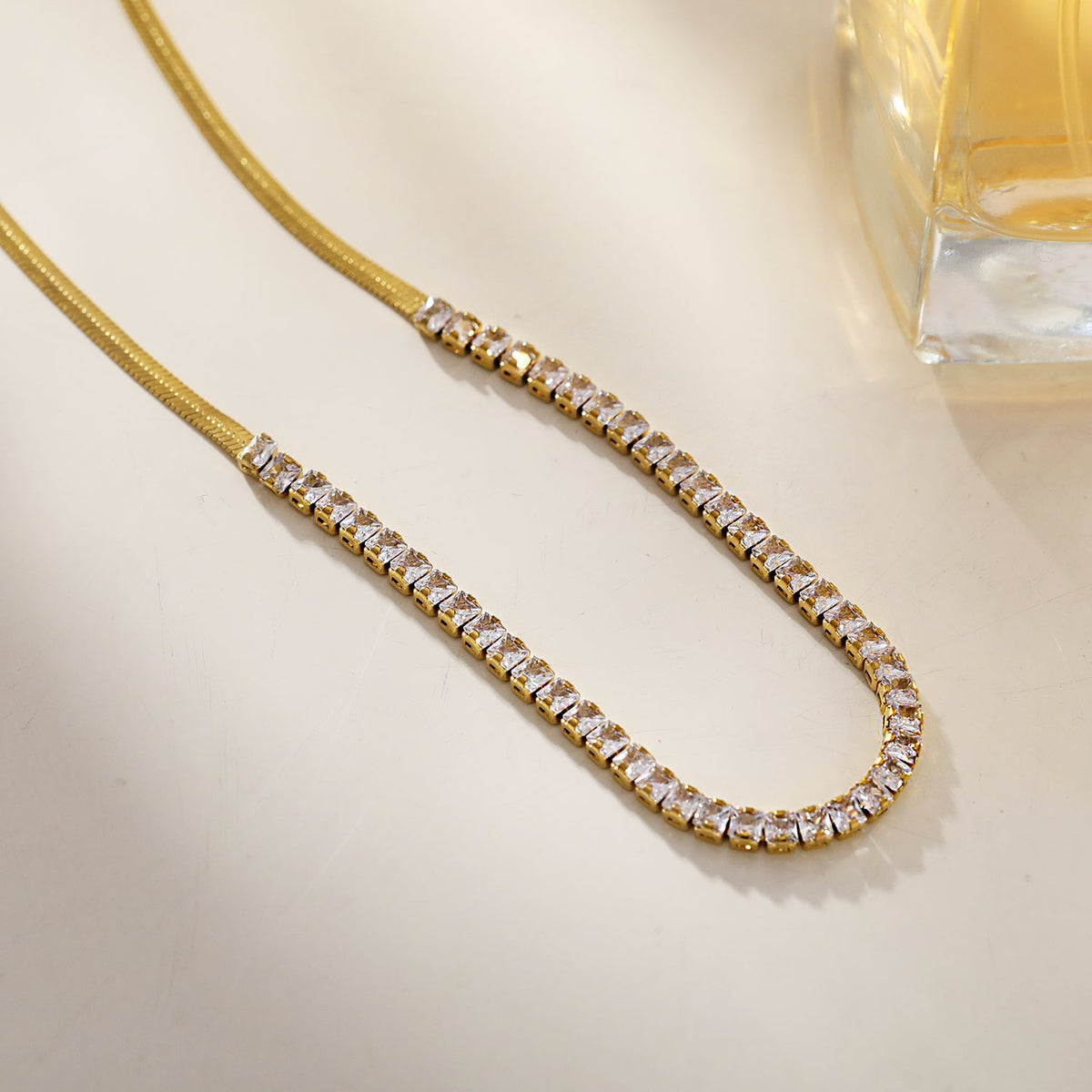 MESTIA : Collier combiné avec chaînes texturées peau de serpent et tennis