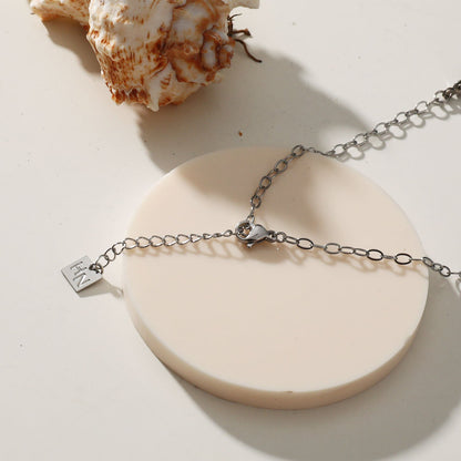 Collier LORENA en chaîne trombone avec perles noires et argentées