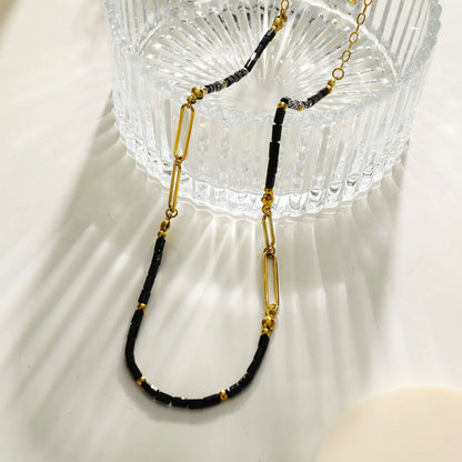 Collier chaîne trombone perlé LORENA noir et or