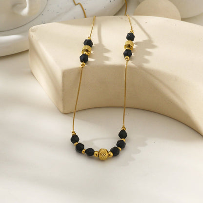 Collier chaîne perles obsidienne noire et or MARA