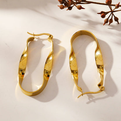 Boucles d'oreilles créoles semi-imposantes oblongues abstraites torsadées GISELA