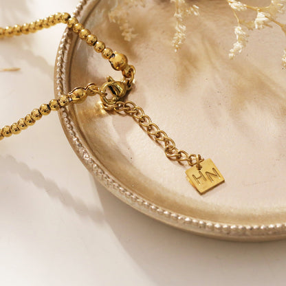 ELISA : Collier chaîne perles d'eau douce et billes dorées