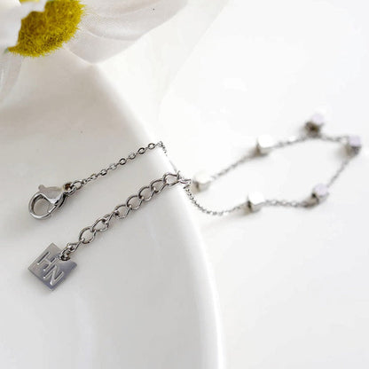DARBY: Bracelet en argent perlé carré