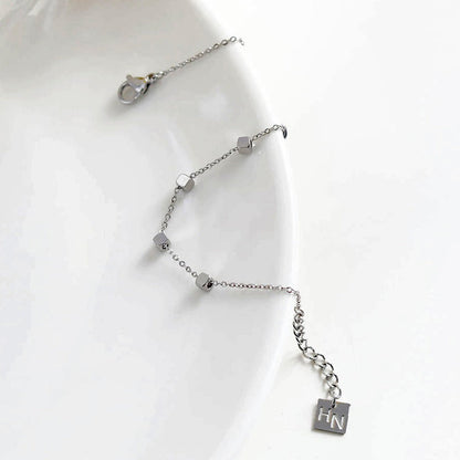 DARBY: Bracelet en argent perlé carré