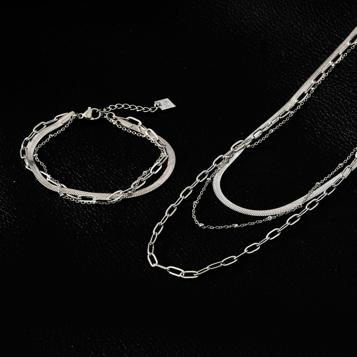 REINEDA: Bracelet triple en or blanc (ton argenté)