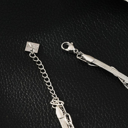 REINEDA: Bracelet triple en or blanc (ton argenté)