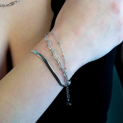 REINEDA: Bracelet triple en or blanc (ton argenté)