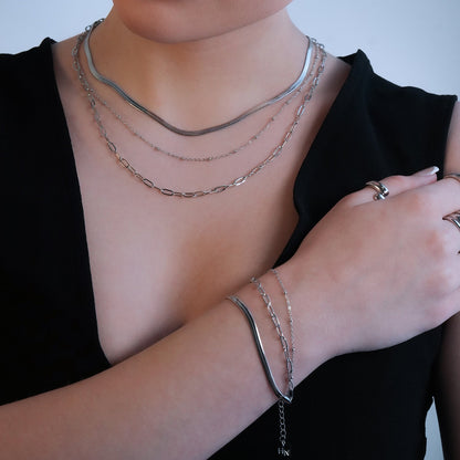REINEDA: Bracelet triple en or blanc (ton argenté)