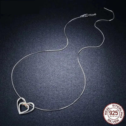 Entwined Hearts: Sterling Silver Infinity Necklace With Double Hearts