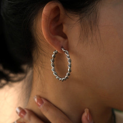 Boucles d'oreilles créoles torsadées SUKI en argent