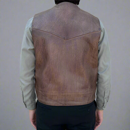 Gilet en cuir de vachette pour homme. Style classique avec fermeture à bouton-pression et poches avant